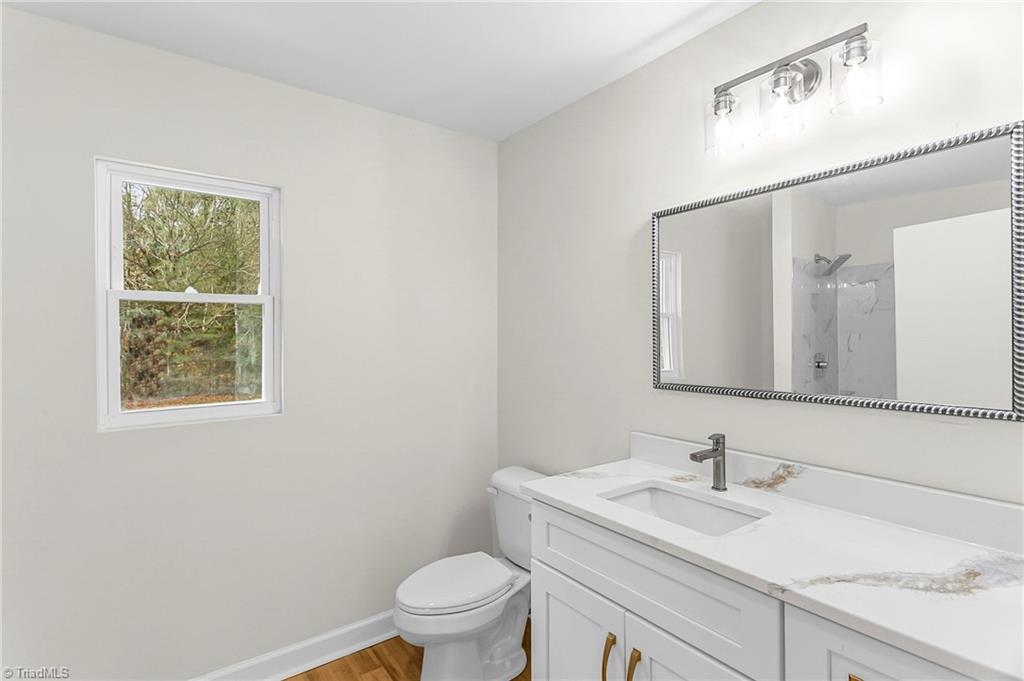 4713 Highway 87 Graham, NC 27253 - Photo 14 of 32 Full Bath/Shower with Custom Cabinets and Quartz Vanity Top with Under Mount Sink
