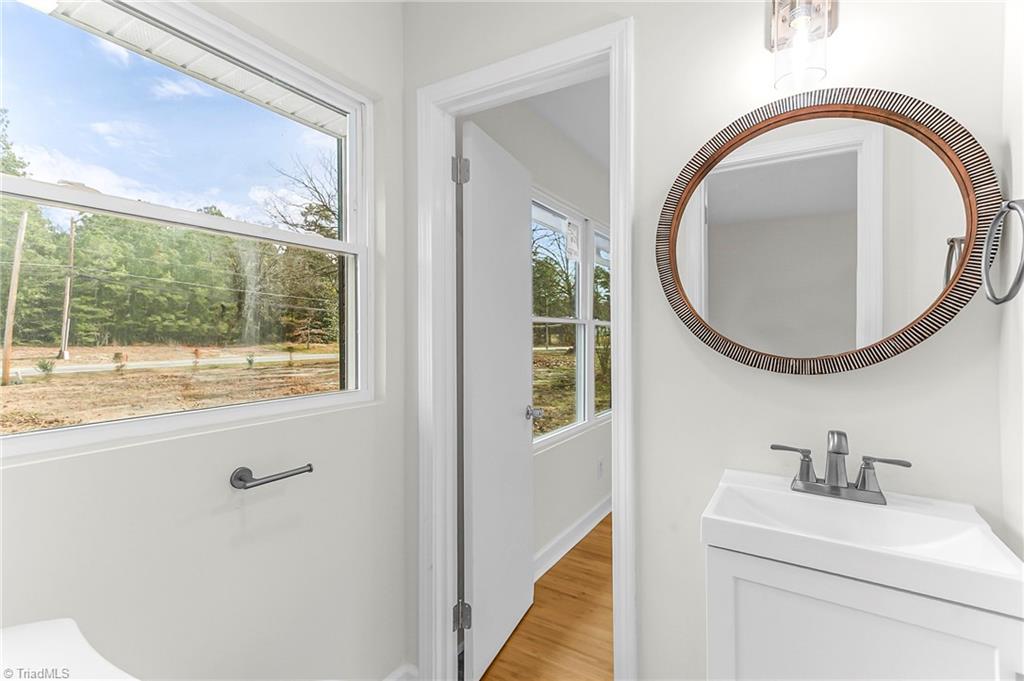 4713 Highway 87 Graham, NC 27253 - Photo 19 of 32 Jack and Jill Half Bath