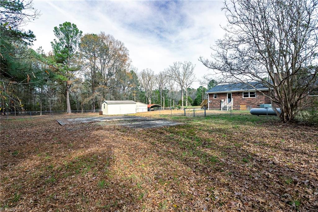 4713 Highway 87 Graham, NC 27253 - Photo 28 of 32 View of Back Yard