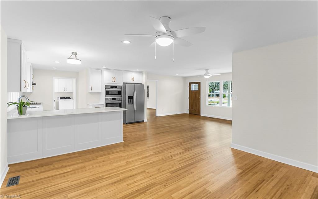 4713 Highway 87 Graham, NC 27253 - Photo 32 of 32 Open Floor Plan and Beautiful New Lighting through Home