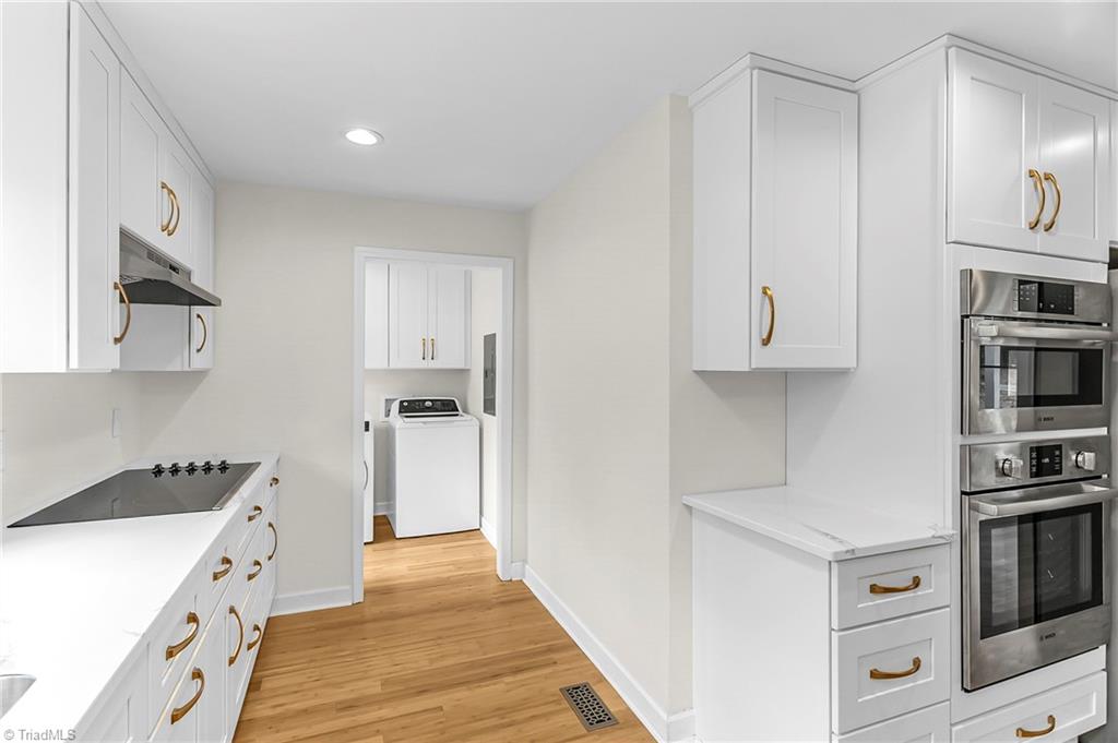 4713 Highway 87 Graham, NC 27253 - Photo 6 of 32 Laundry Room w/New Custom Cabinets off of Kitchen