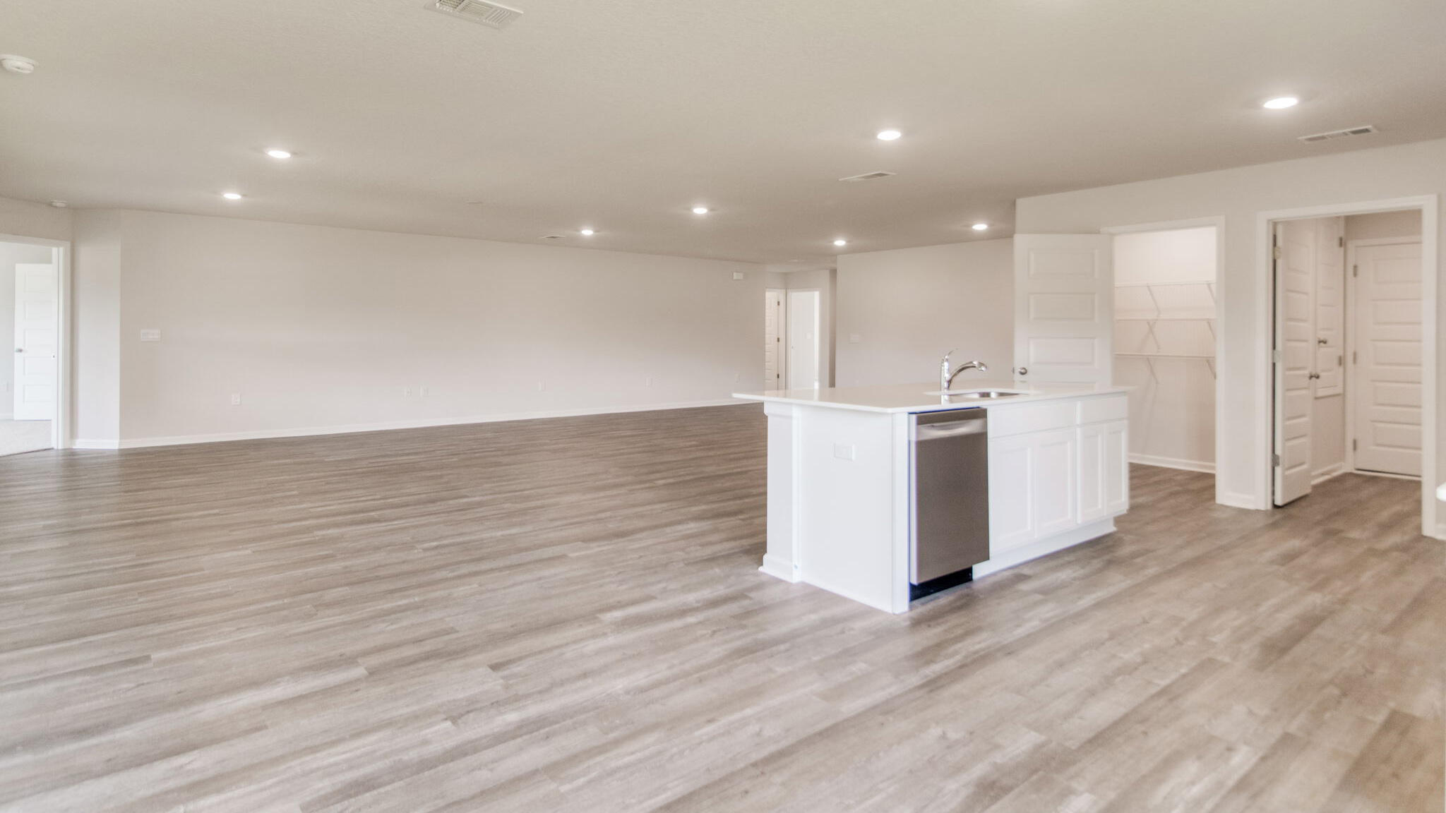 5631 Thatcher Road Crestview, FL 32539 - Photo 7 of 30 a view of a kitchen with wooden floor