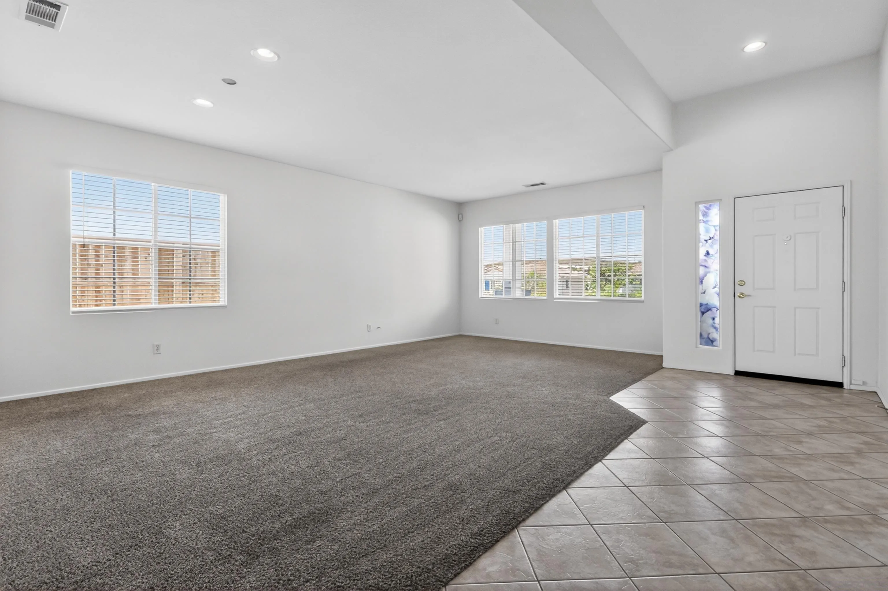 1432 Belmont Park Road Oceanside, CA 92057 - Photo 14 of 54 an empty room with windows and closet