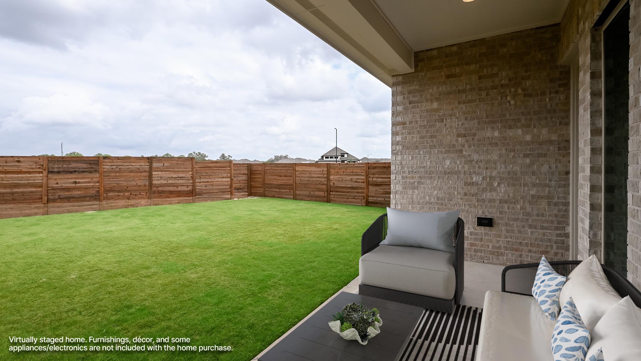 3921 Melody Road Lockhart, TX 78644 - Photo 6 of 30 a view of a backyard with seating area and barbeque oven