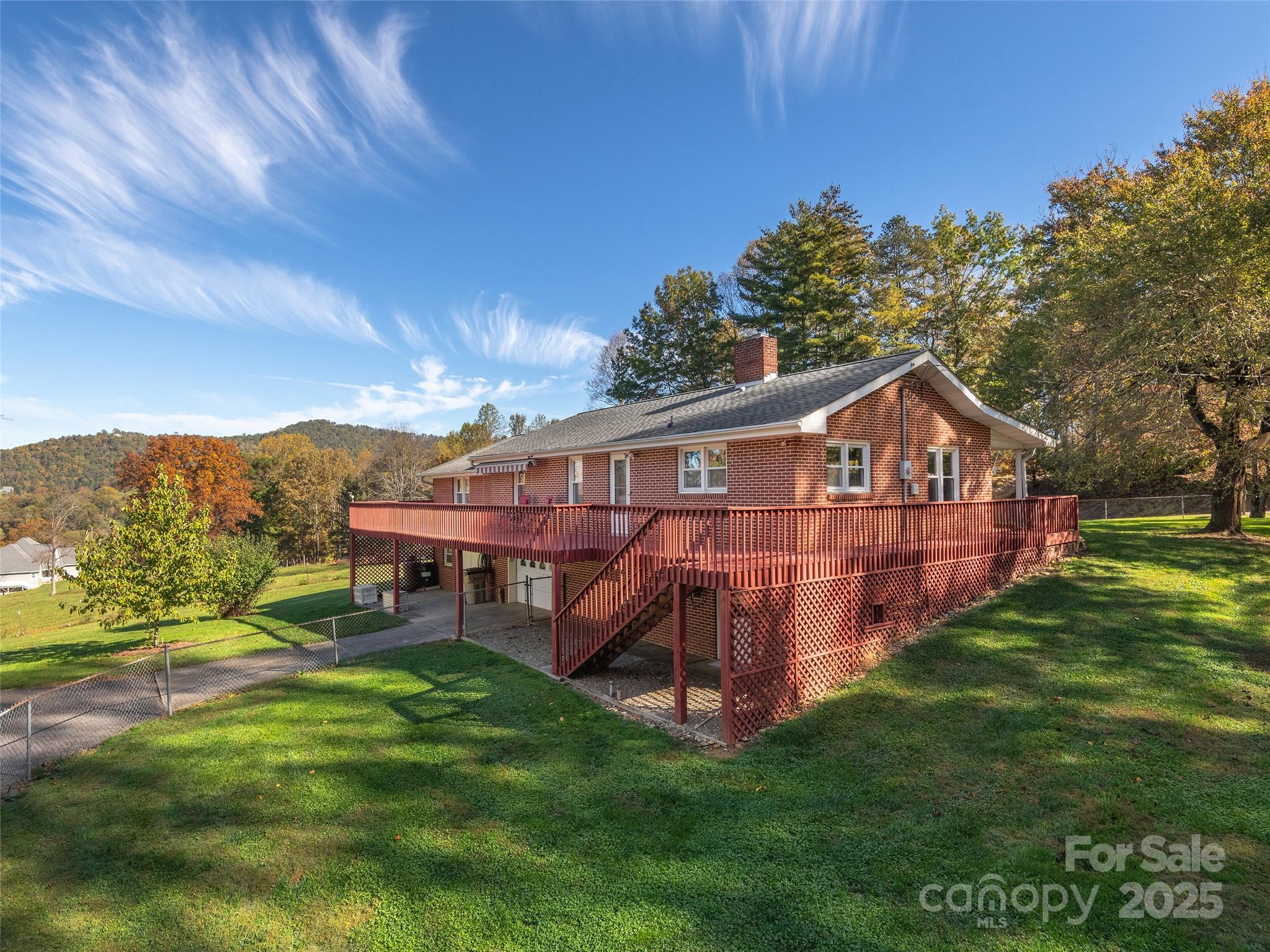 1005 Hutch Mountain Road Fletcher, NC 28732 - Photo 20 of 20 a view of a house with a yard