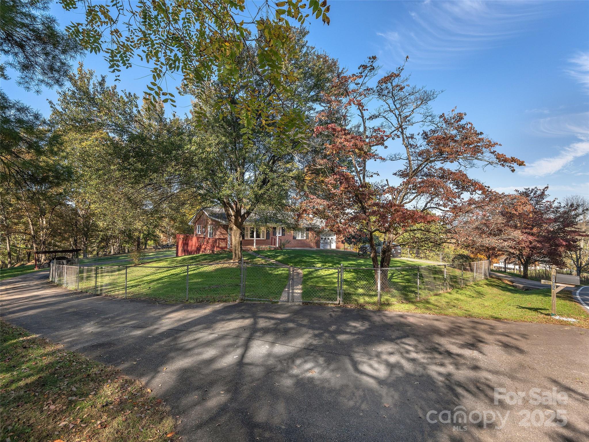 1005 Hutch Mountain Road Fletcher, NC 28732 - Photo 3 of 20 a view of a park with large trees