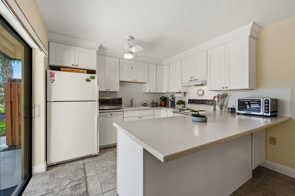 $260,000 | 5720 Southeast Windsong Lane, Unit 326, Stuart, FL 34997