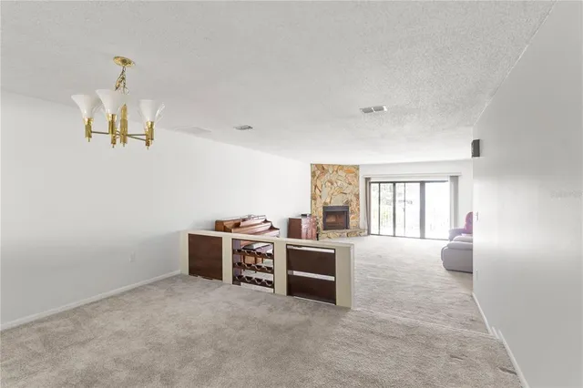 a view of a livingroom with a furniture