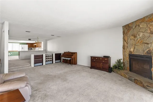 a room with furniture and a fireplace