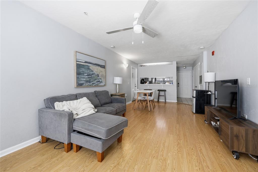 4000 Unit, Unit 3108 Gainesville, FL 32608 - Photo 4 of 20 a living room with furniture and a flat screen tv