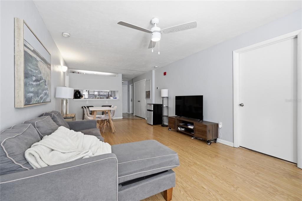4000 Unit, Unit 3108 Gainesville, FL 32608 - Photo 5 of 20 a living room with furniture and a flat screen tv