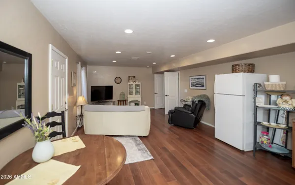 a kitchen with stainless steel appliances granite countertop a stove a sink dishwasher and a refrigerator