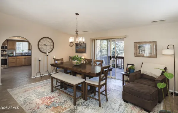 a view of a dining room with furniture