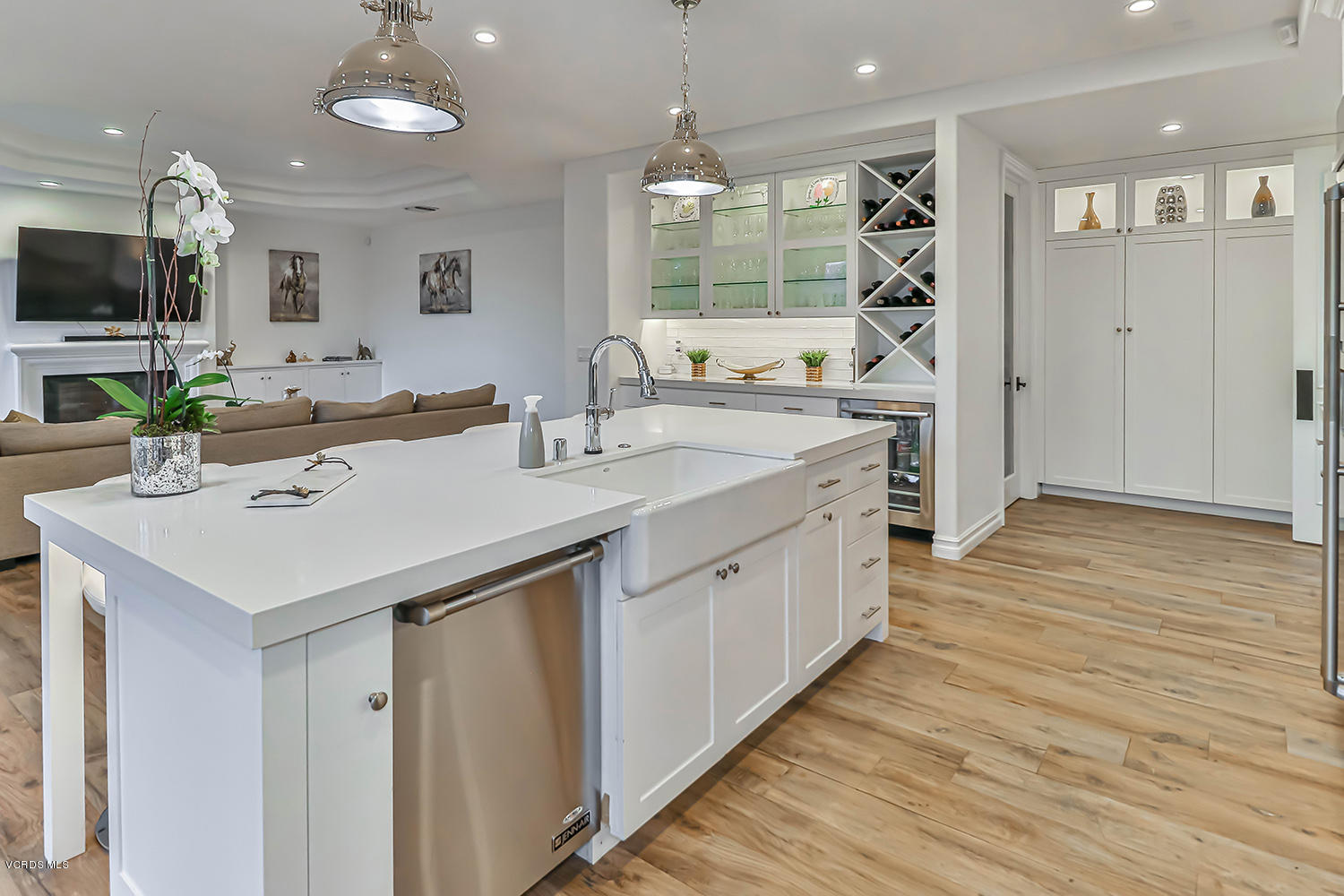 22457 North Summit Ridge Circle Chatsworth, CA 91311 - Photo 17 of 63 a kitchen with a sink and a refrigerator