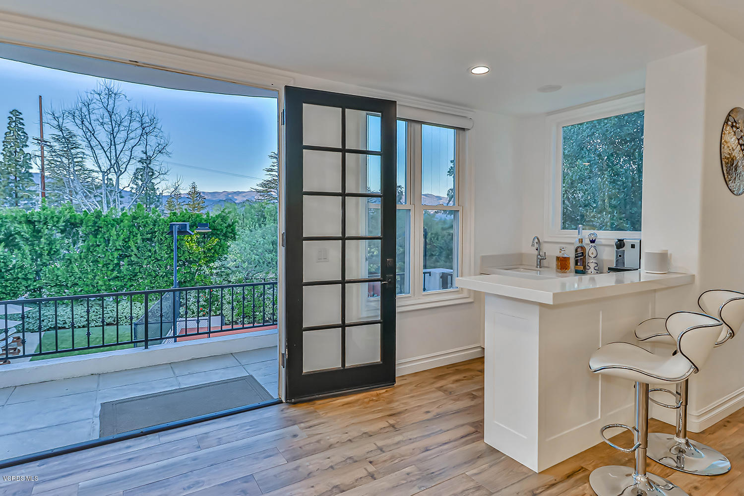 22457 North Summit Ridge Circle Chatsworth, CA 91311 - Photo 21 of 63 a living room with a large window