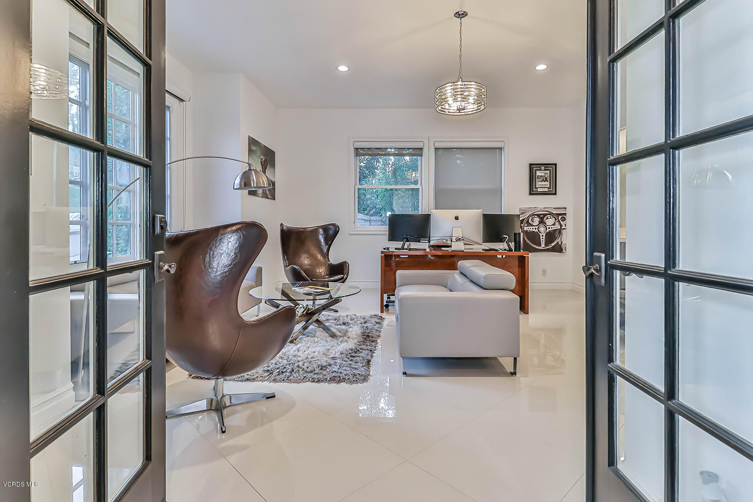 22457 North Summit Ridge Circle Chatsworth, CA 91311 - Photo 27 of 63 a living room with furniture