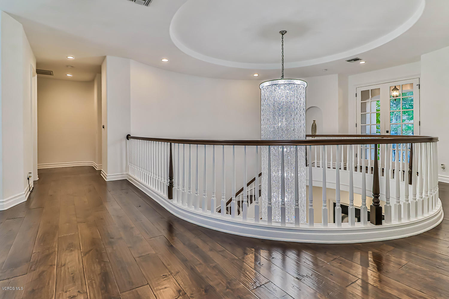 22457 North Summit Ridge Circle Chatsworth, CA 91311 - Photo 29 of 63 a view of entryway and hall with wooden floor