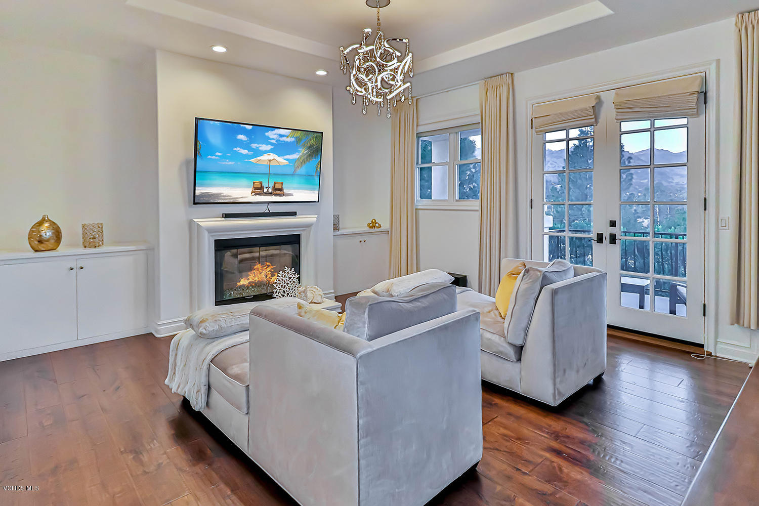 22457 North Summit Ridge Circle Chatsworth, CA 91311 - Photo 31 of 63 a living room with furniture and a fireplace