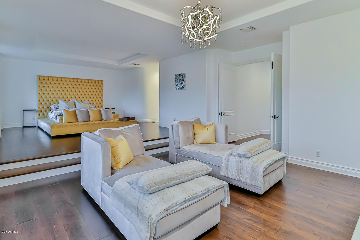 22457 North Summit Ridge Circle Chatsworth, CA 91311 - Photo 33 of 63 a living room with furniture and a wooden floor