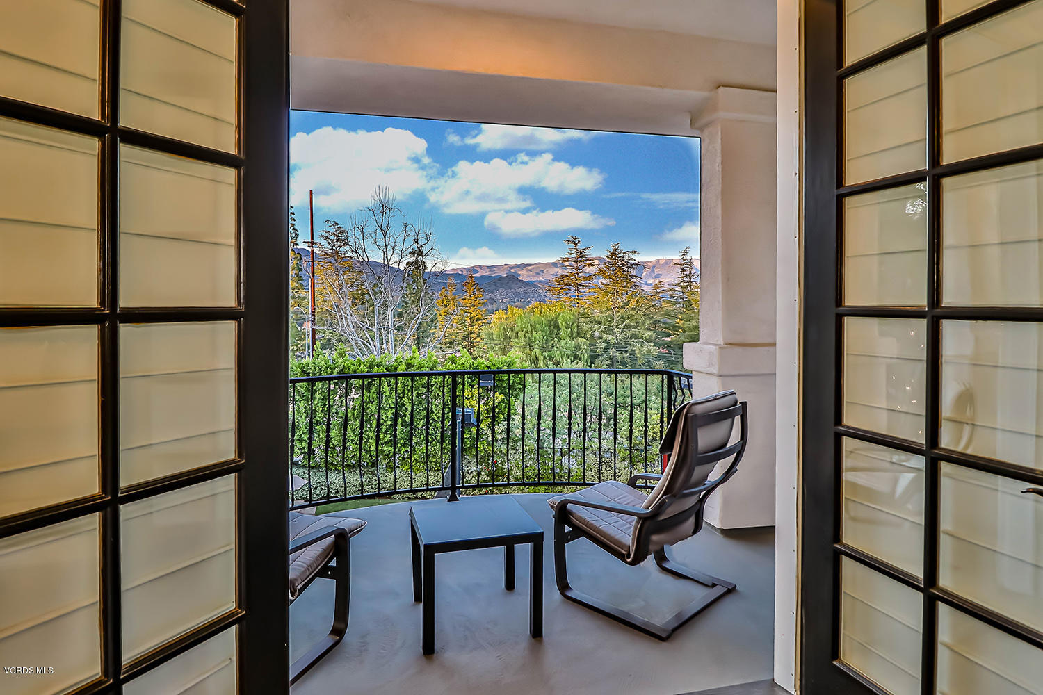 22457 North Summit Ridge Circle Chatsworth, CA 91311 - Photo 36 of 63 a view of a city from a balcony