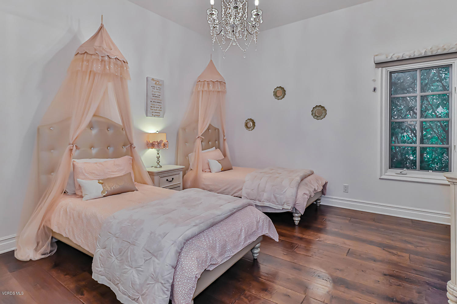 22457 North Summit Ridge Circle Chatsworth, CA 91311 - Photo 41 of 63 a bedroom with two beds and a large window