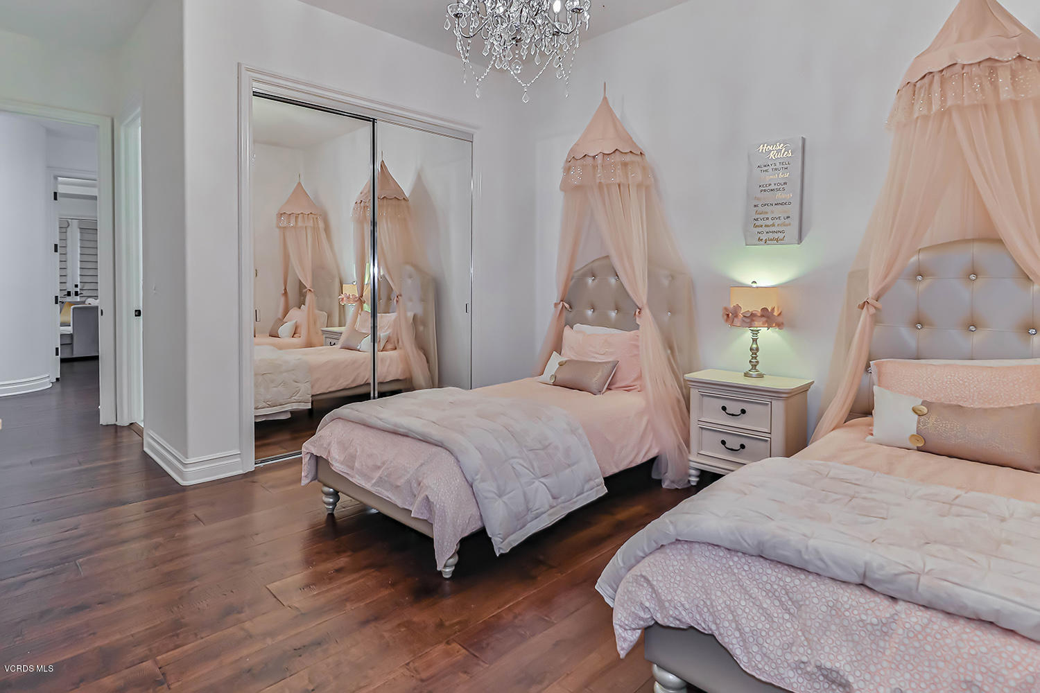 22457 North Summit Ridge Circle Chatsworth, CA 91311 - Photo 42 of 63 a bedroom with two beds and a table