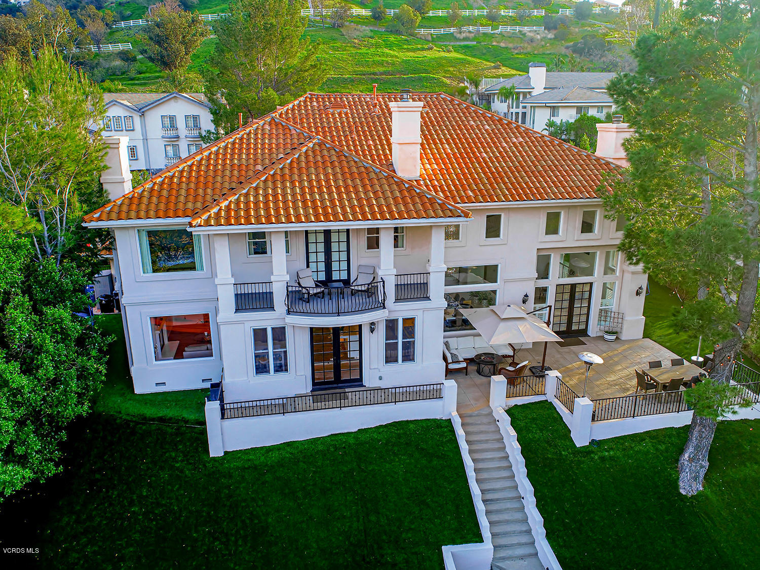 22457 North Summit Ridge Circle Chatsworth, CA 91311 - Photo 61 of 63 a front view of a house with garden