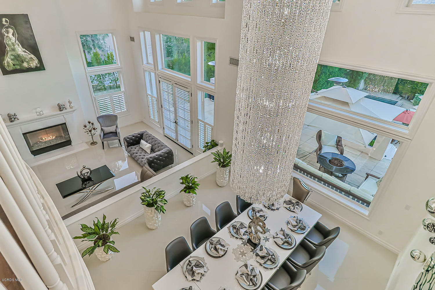 22457 North Summit Ridge Circle Chatsworth, CA 91311 - Photo 9 of 63 a living room with furniture and floor to ceiling windows