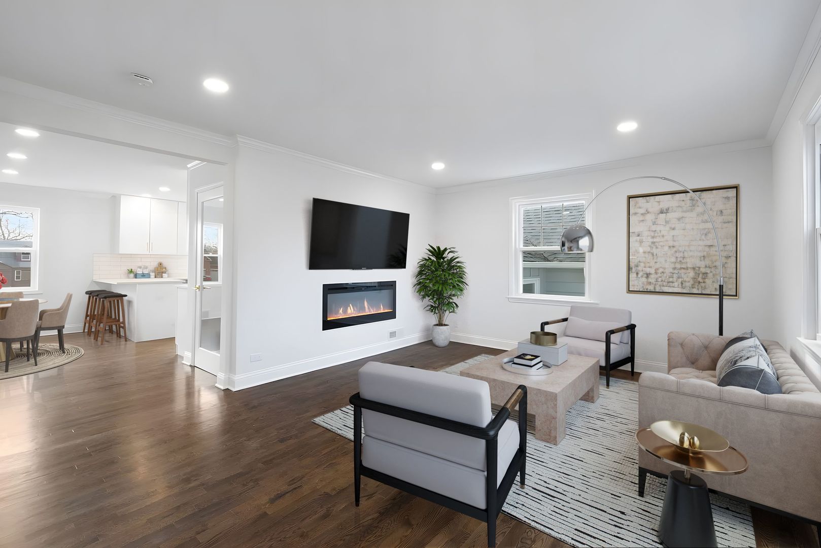 9048 Oneill Drive Burr Ridge, IL 60527 - Photo 5 of 32 a living room with furniture a dining table and a flat screen tv