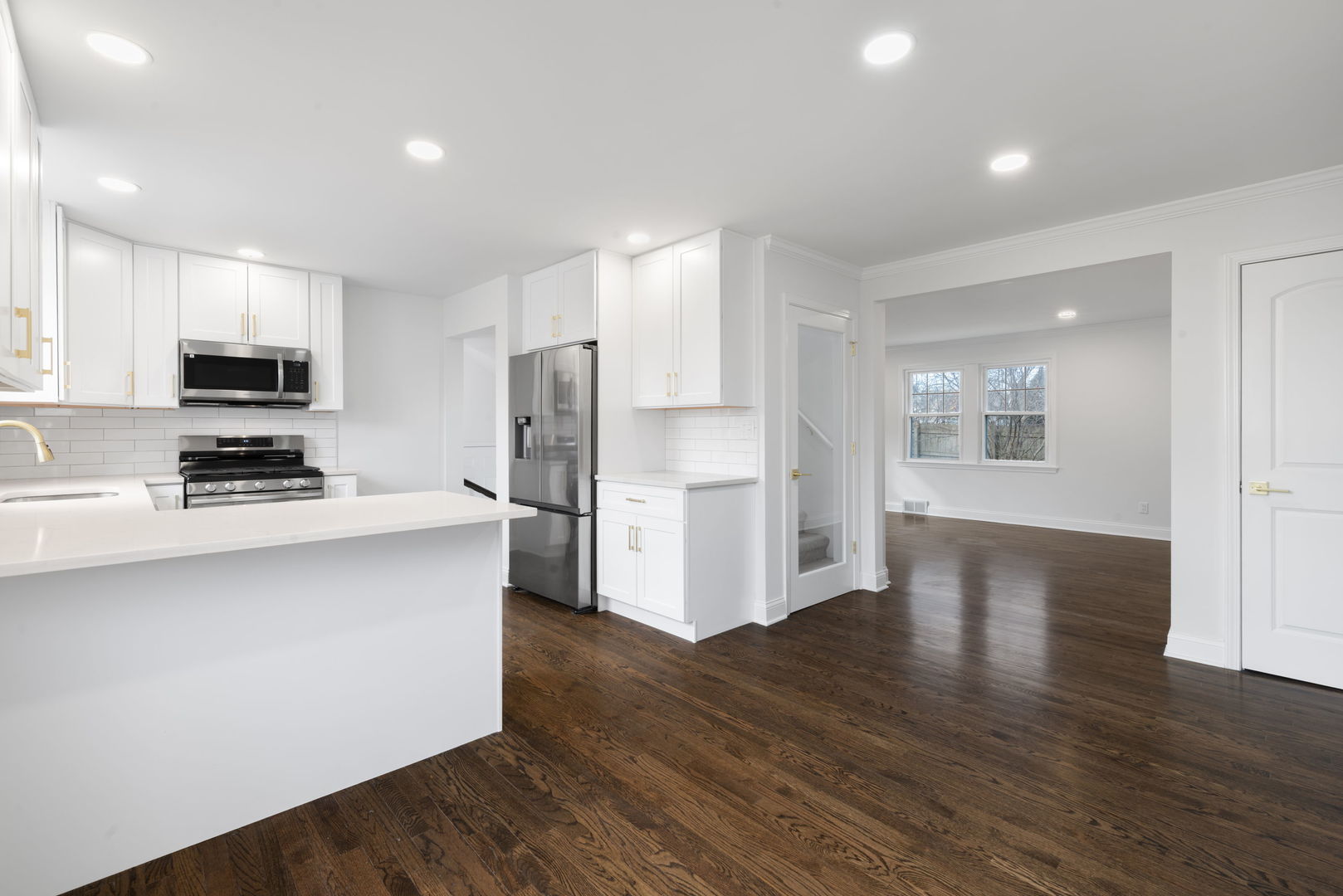 9048 Oneill Drive Burr Ridge, IL 60527 - Photo 9 of 32 a kitchen with stainless steel appliances a refrigerator and a stove top oven