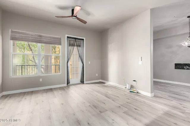 a bathroom with a granite countertop sink and a washing machine
