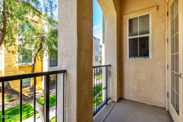 a swimming pool with outdoor seating and yard