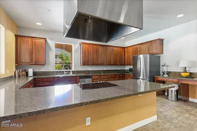 a very nice looking living room with furniture and wooden floor