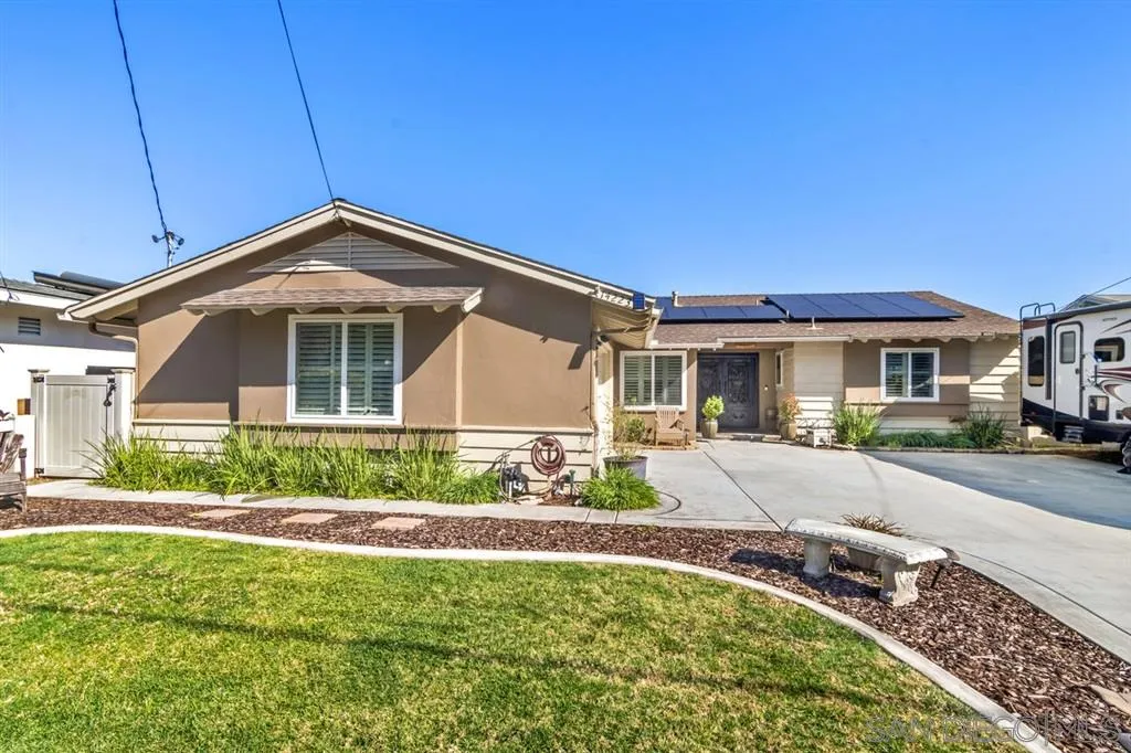 14223 Halper Road Poway, CA 92064 - Photo 3 of 25 a front view of a house with a yard