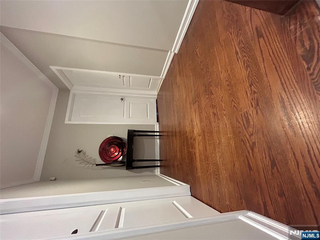 220 Butternut Drive Wayne, NJ 07470 - Photo 12 of 24 a view of an empty room and painting on the wall