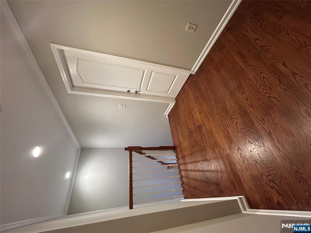 220 Butternut Drive Wayne, NJ 07470 - Photo 19 of 24 an empty room with wooden floor and windows