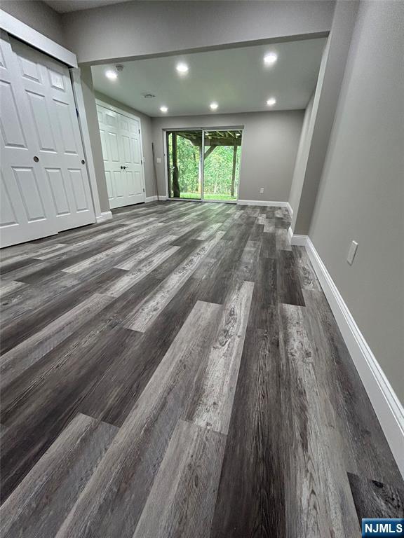 220 Butternut Drive Wayne, NJ 07470 - Photo 22 of 24 a view of an empty room and wooden floor