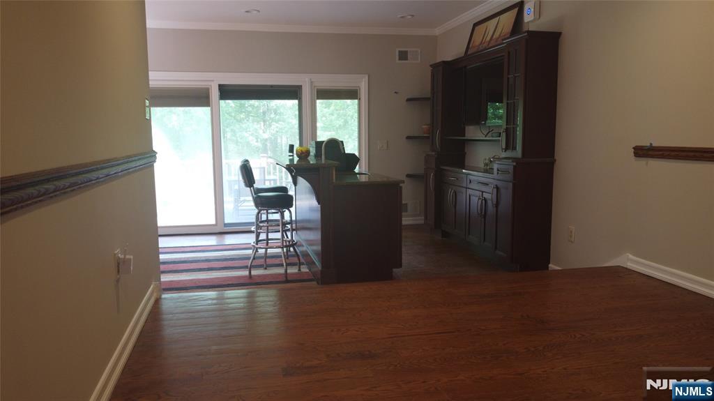 220 Butternut Drive Wayne, NJ 07470 - Photo 6 of 24 a view of a dining room with furniture window and outside view