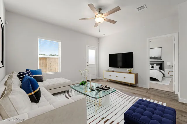 a view of an empty room with a window