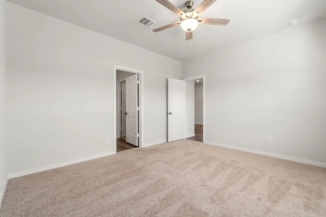 a bathroom with a sink vanity and a mirror