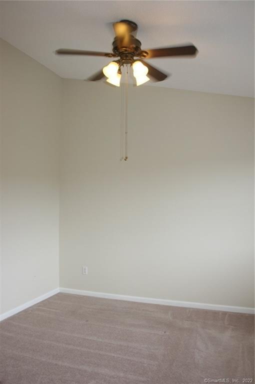 92 Commodore Cmns, Unit 92 Derby, CT 06418 - Photo 15 of 21 a view of a small space with wooden floor and a chandelier
