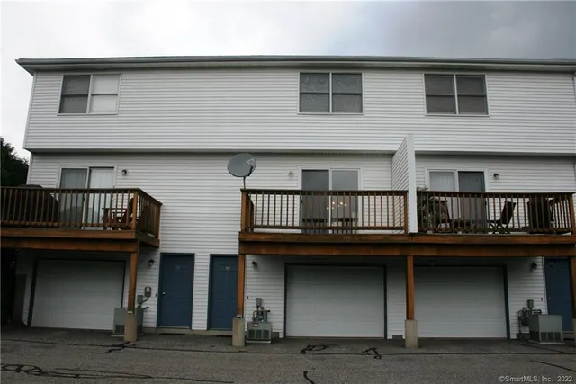 a front view of a building with glass windows