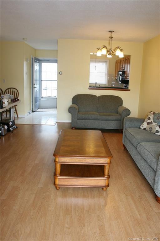 92 Commodore Cmns, Unit 92 Derby, CT 06418 - Photo 8 of 21 a bedroom with a bed and window