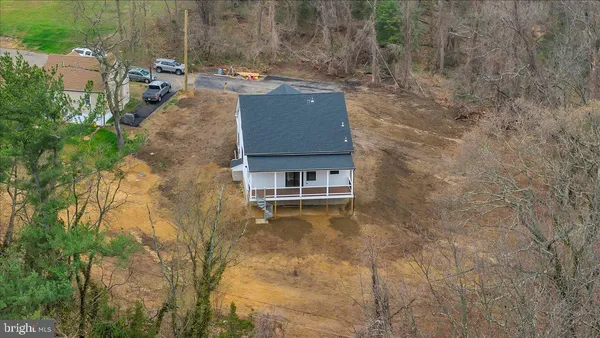 view of a house with a yard