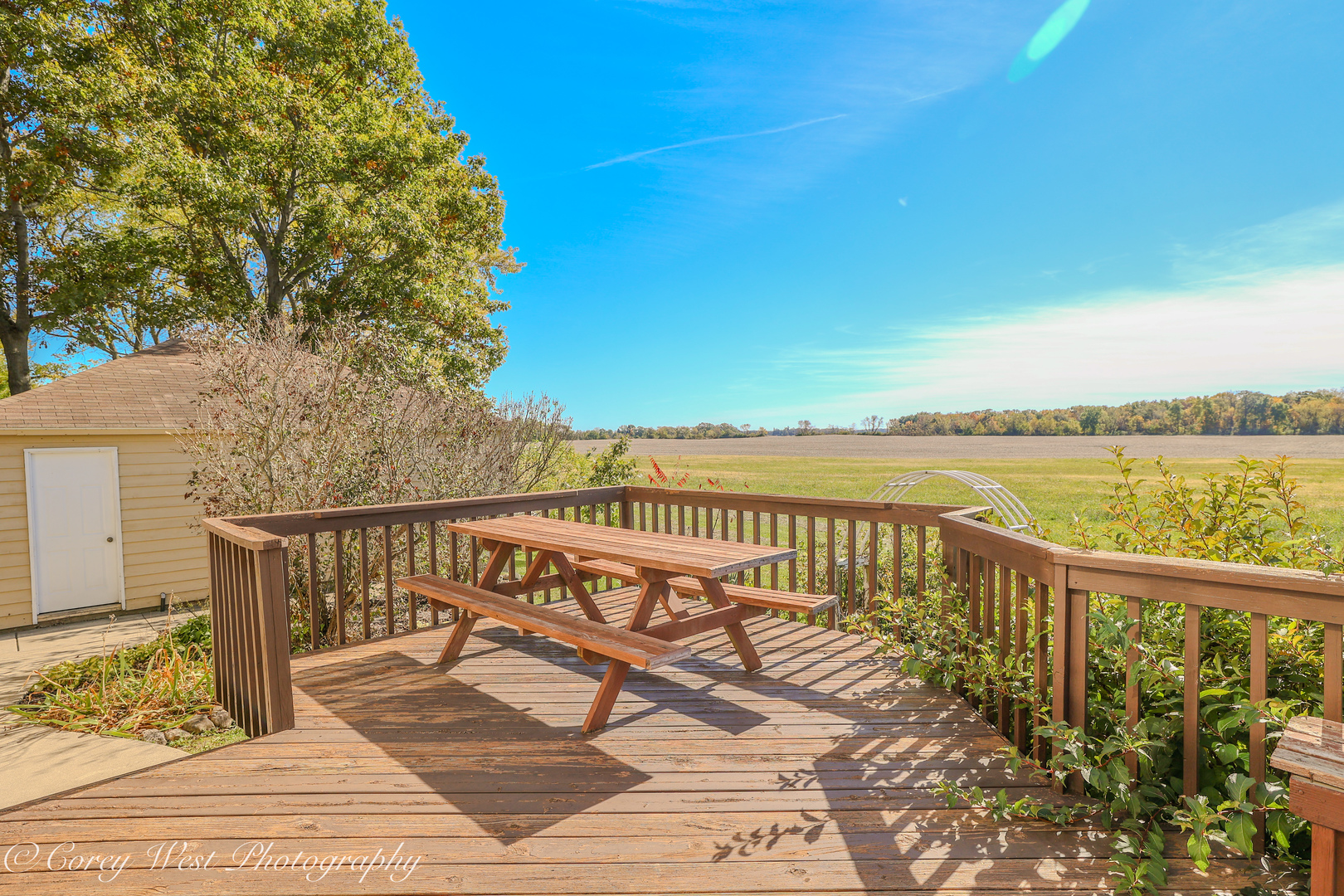 11N315 McGough Road Hampshire, IL 60140 - Photo 25 of 49 a view of a balcony with wooden floor and fence