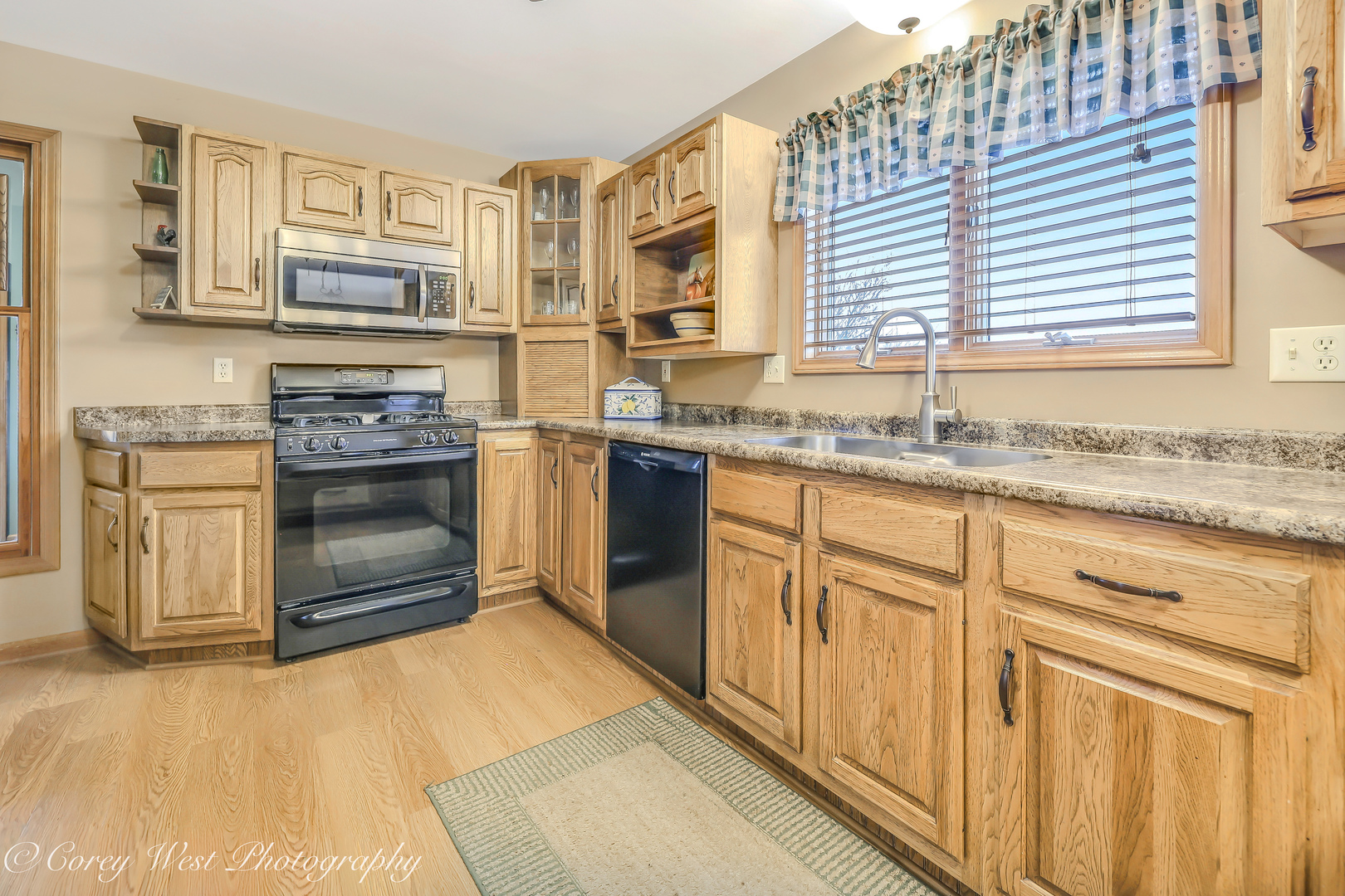 11N315 McGough Road Hampshire, IL 60140 - Photo 5 of 49 a kitchen with stainless steel appliances granite countertop a stove and cabinets