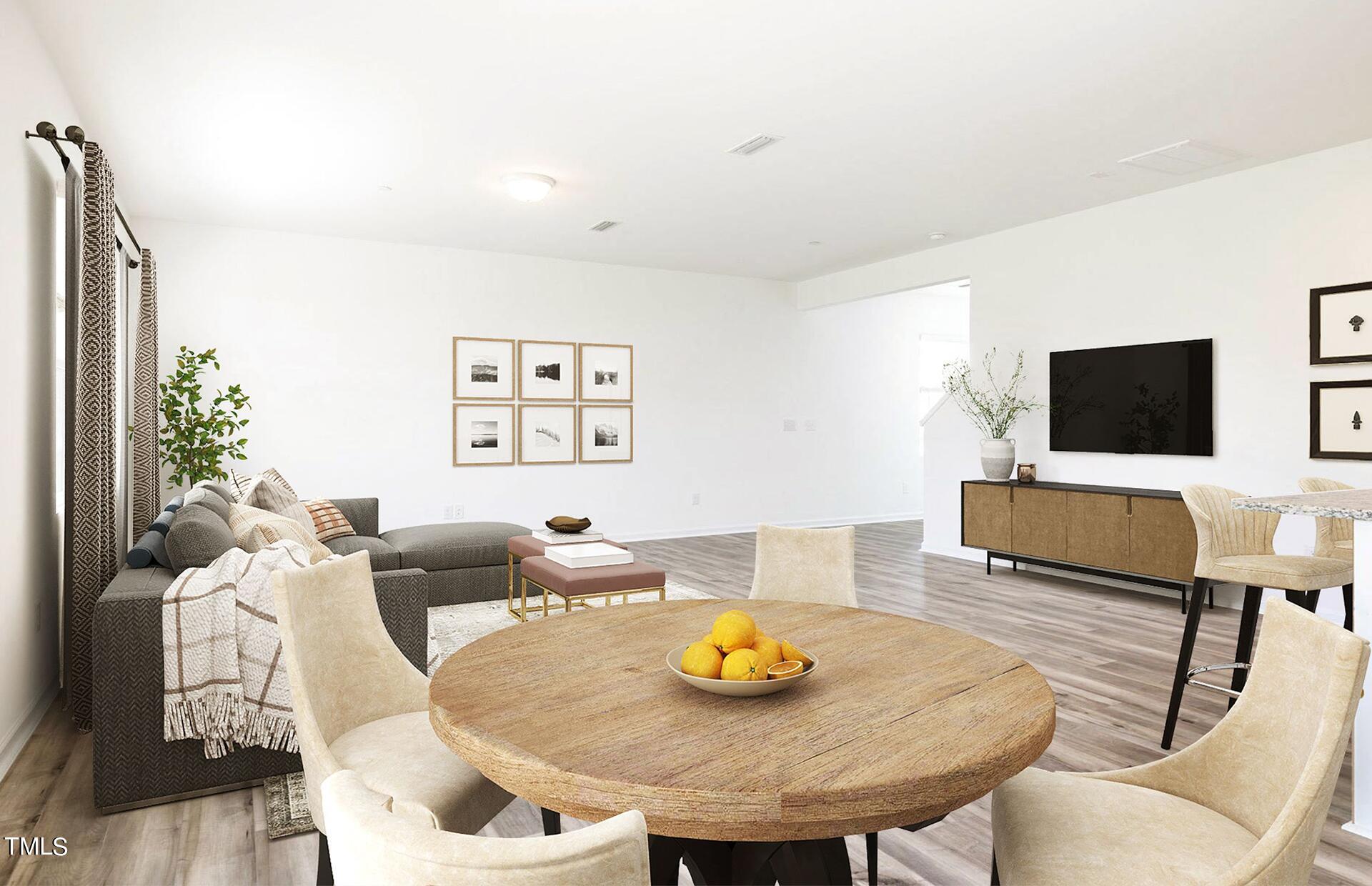 537 Campbell Rdg Place Wendell, NC 27591 - Photo 5 of 16 a living room with furniture and a flat screen tv