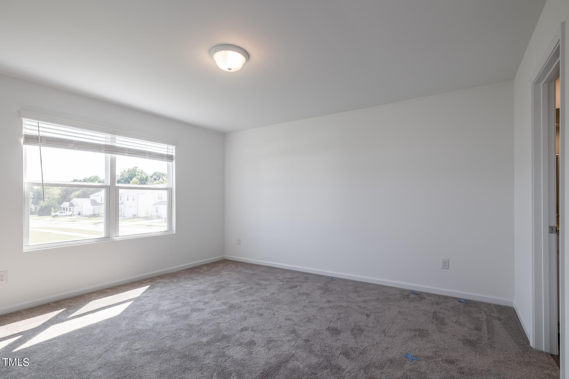 537 Campbell Rdg Place Wendell, NC 27591 - Photo 10 of 16 an empty room with a window