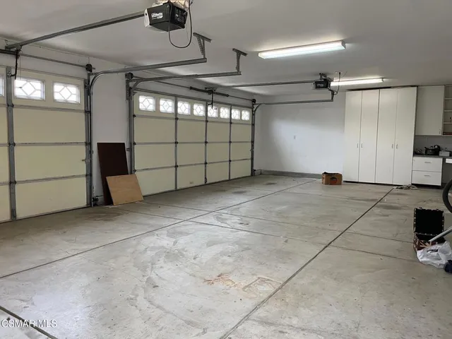 a view of a porch with a fence