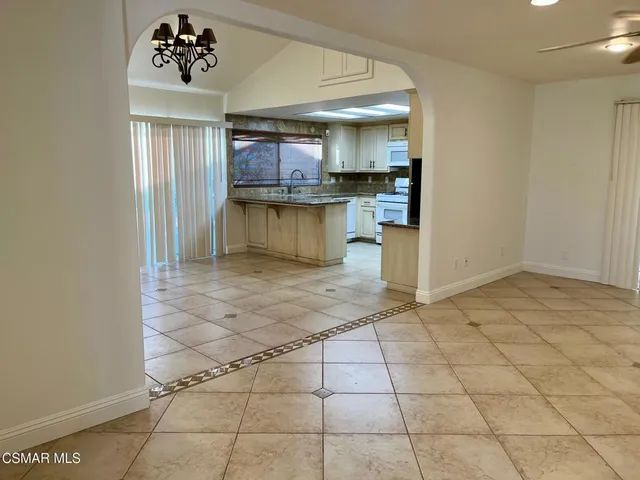 a view of a kitchen with a sink